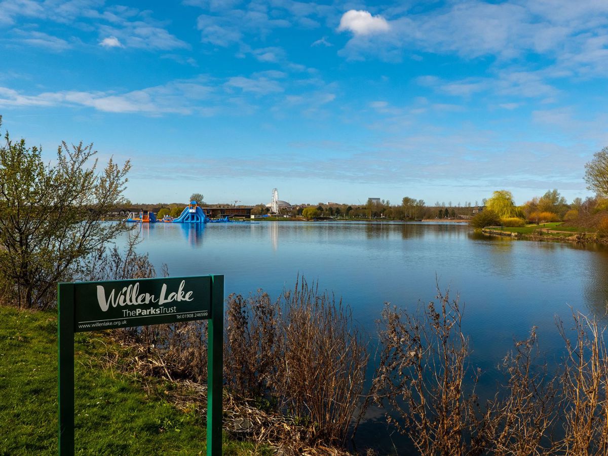 Willen Lake signage with the lake in the background