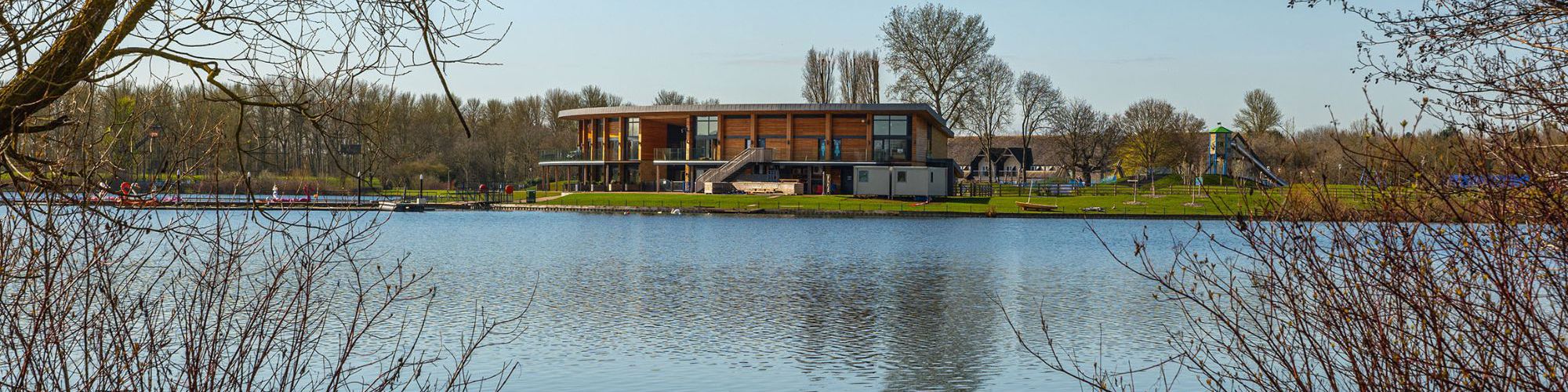 Willen Lake watersports centre from across the lake