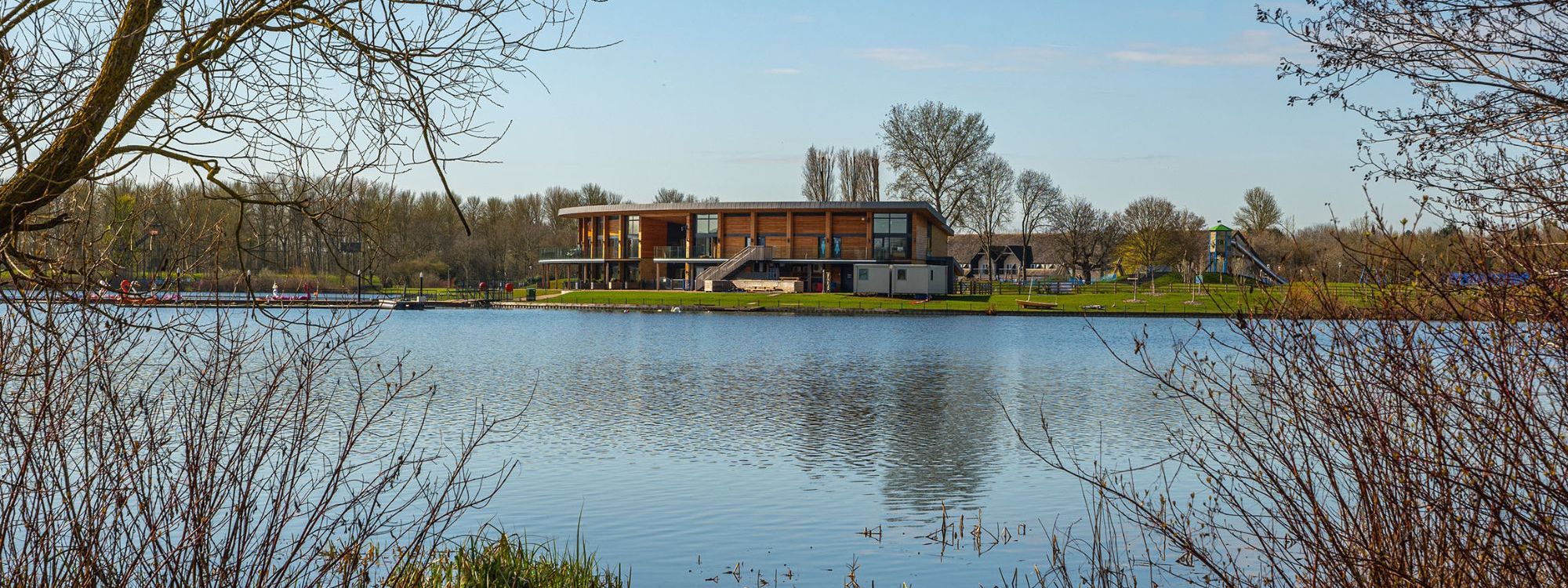 Willen Lake watersports centre from across the lake